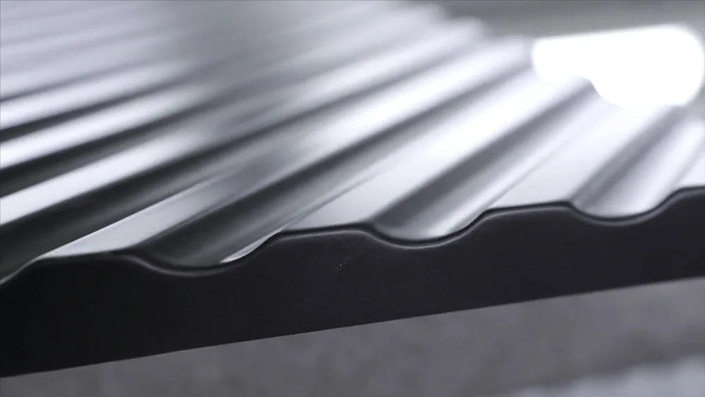 Close up view of black roofing waterproof material, construction and building concept Action The edge of the roofing sheet, dark seam shingles
